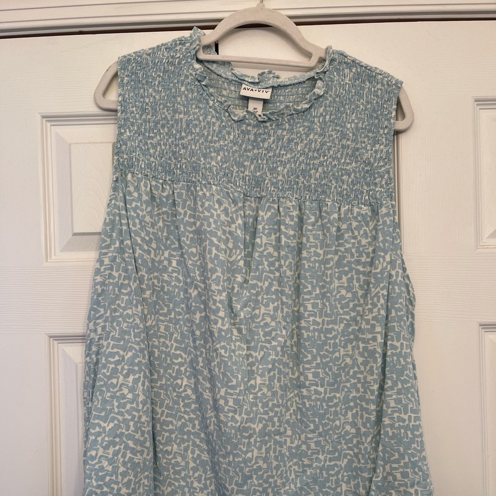 Blue and cream floral blouse